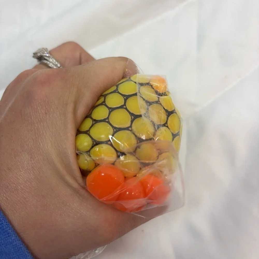 NWT Color Changing Ooze Ball Sensory Fidget Toy- Toy Planet yellow & orange